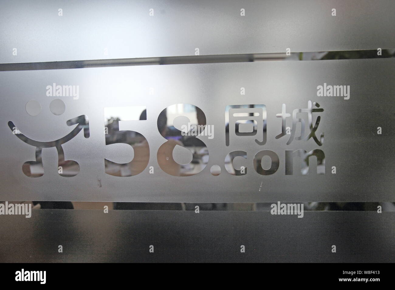 --FILE--A logo of Chinese online classified site 58.com is pictured at ...