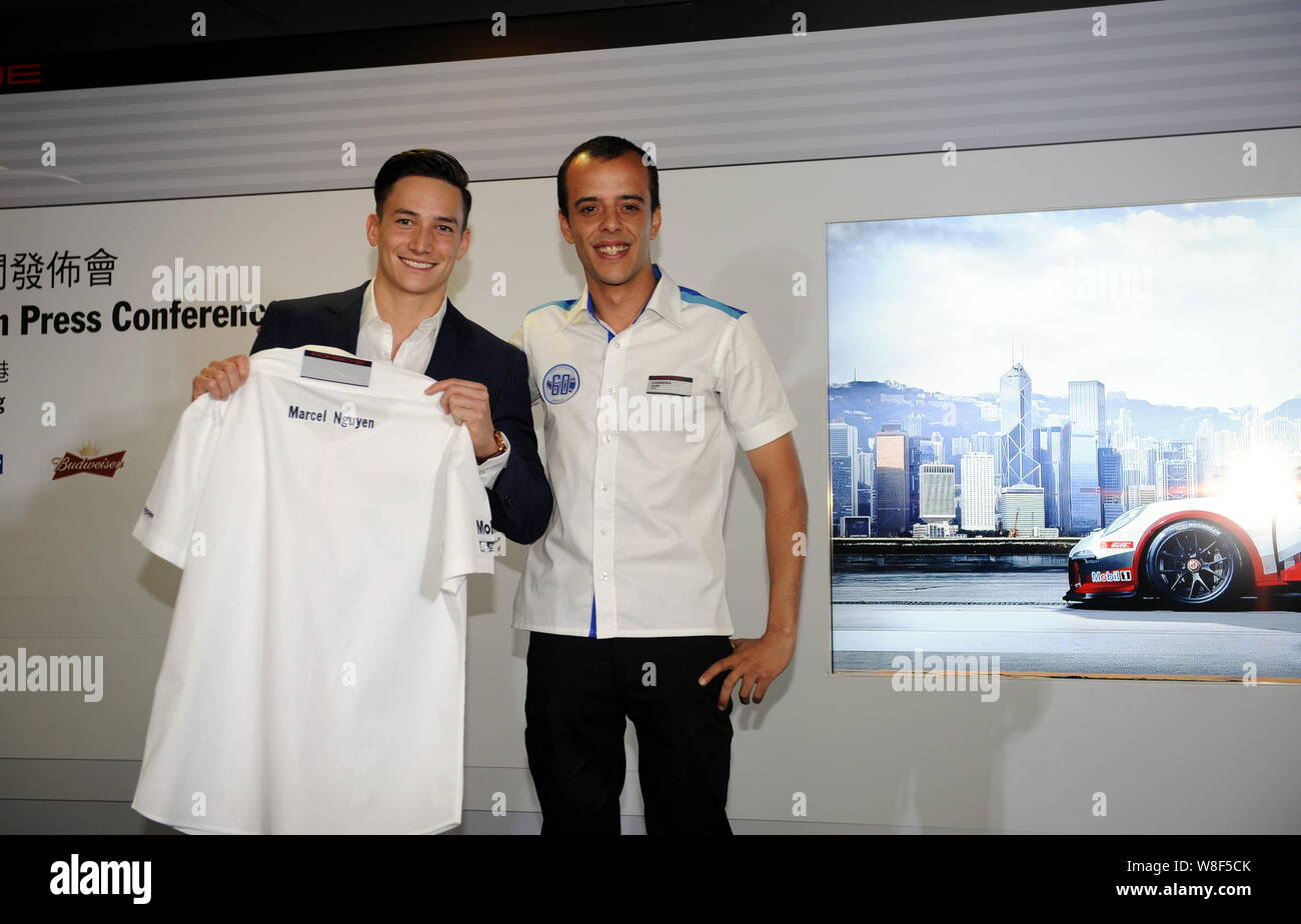 German gymnast Marcel Nguyen, left, poses during a press conference for the 2015 Porsche Carrera Cup Asia season in Hong Kong, China, 1 April 2015. Stock Photo