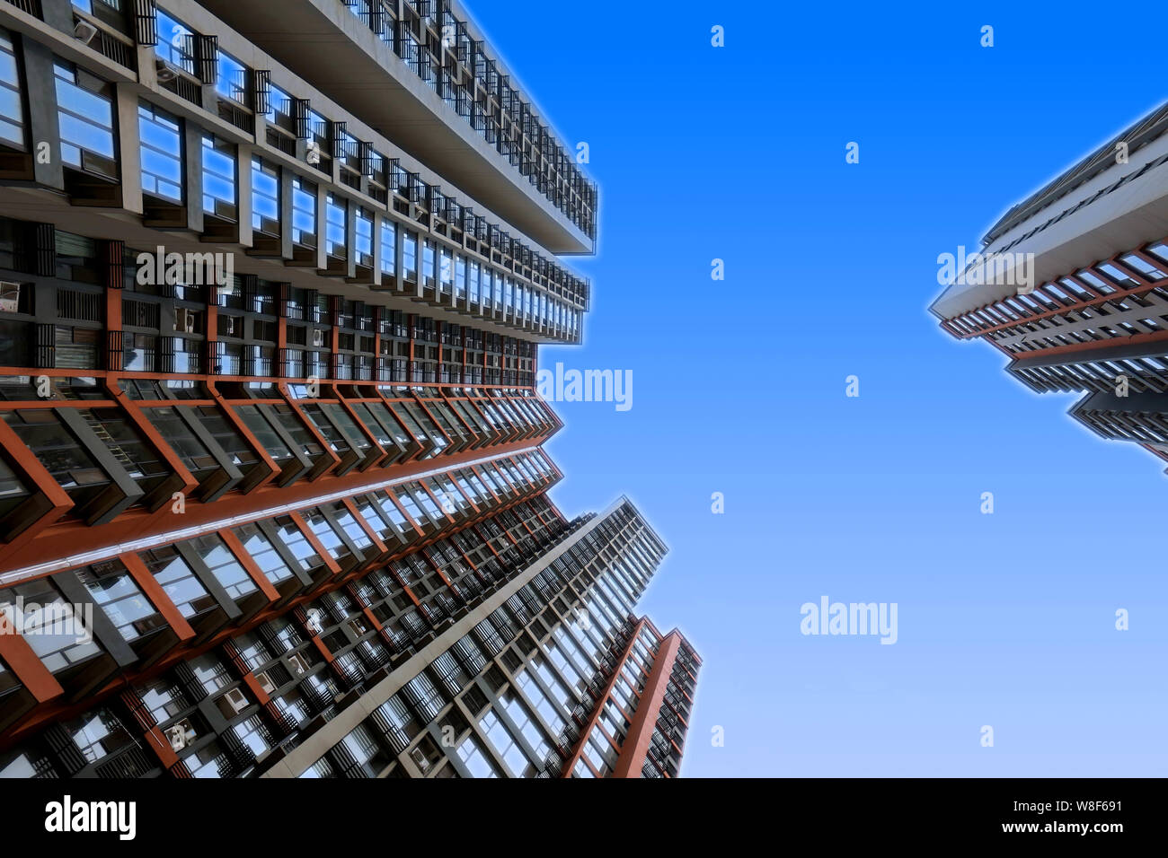 --FILE--Newly-built high-rise residential apartment buildings are pictured in Huai'an city, east China's Jiangsu province, 26 September 2015.   Recove Stock Photo