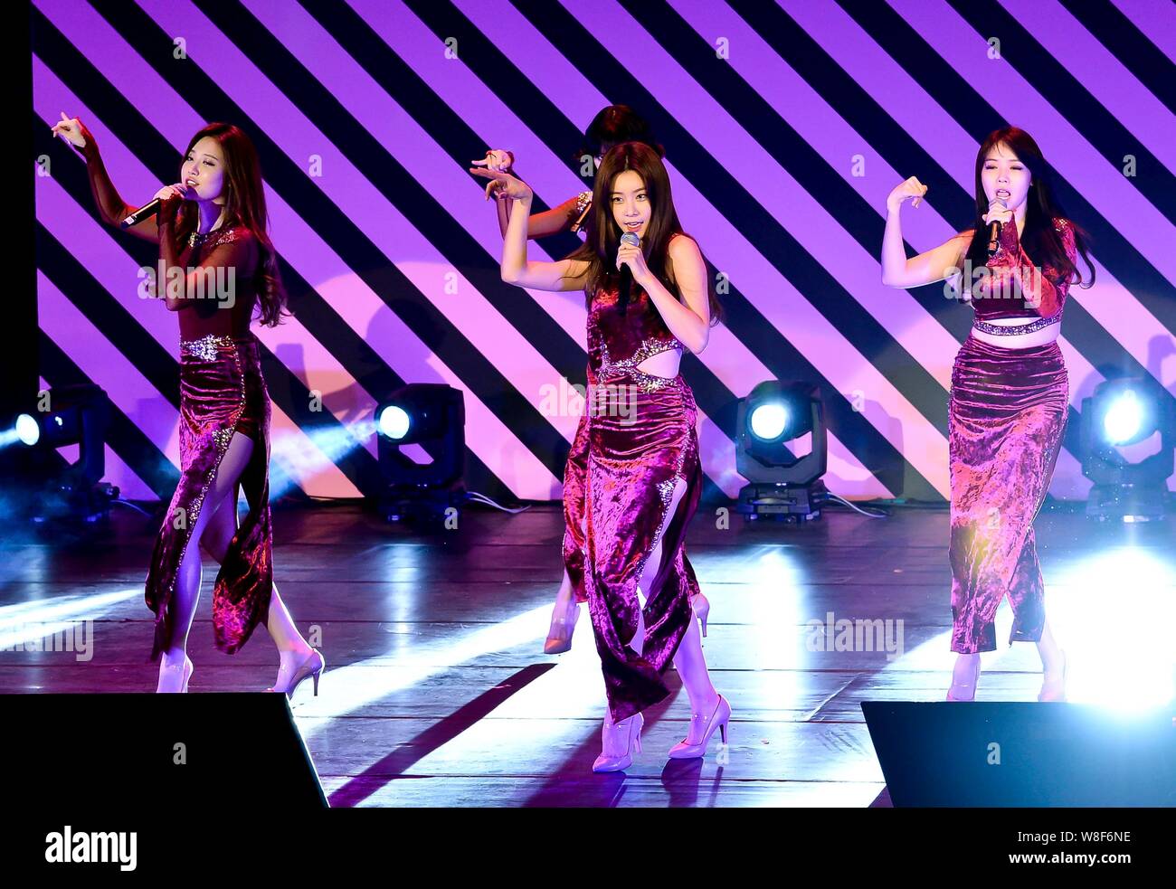 The four members of South Korean girl group Girl's Day perform at a fan ...