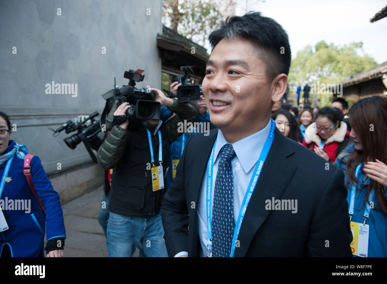 Liu Qiangdong, Chairman and CEO of JD.com, leaves after the opening