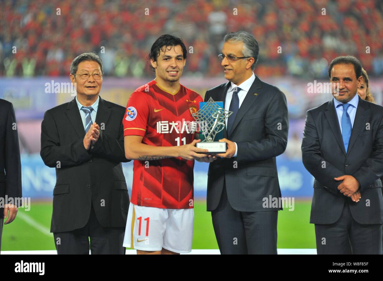 Ricardo Goulart of China's Guangzhou Evergrande, second left, poses ...