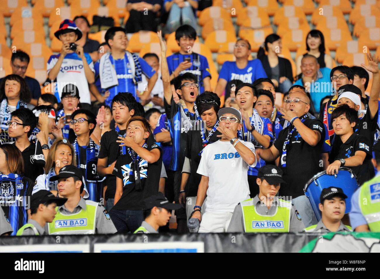 Japanese Football Fans Show Their Support For Gamba Osaka In The First Match Of The Semi Final Between Guangzhou Evergrande And Gamba Osaka During The Stock Photo Alamy