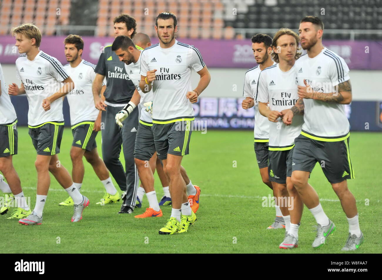 Sergio Ramos, right, Marcelo Vieira, second right, Gareth Bale, center, and  teammates of Real Madrid take part in a training session in Guangzhou city  Stock Photo - Alamy