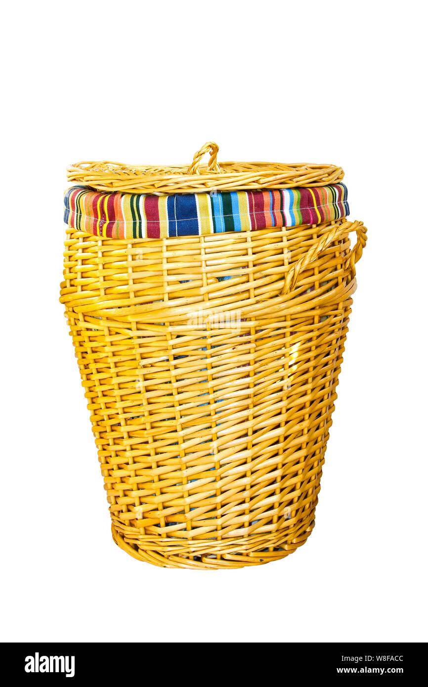 Colorful Ratten Basket Isolated colorful laundry basket made of rattan Stock Photo - Alamy