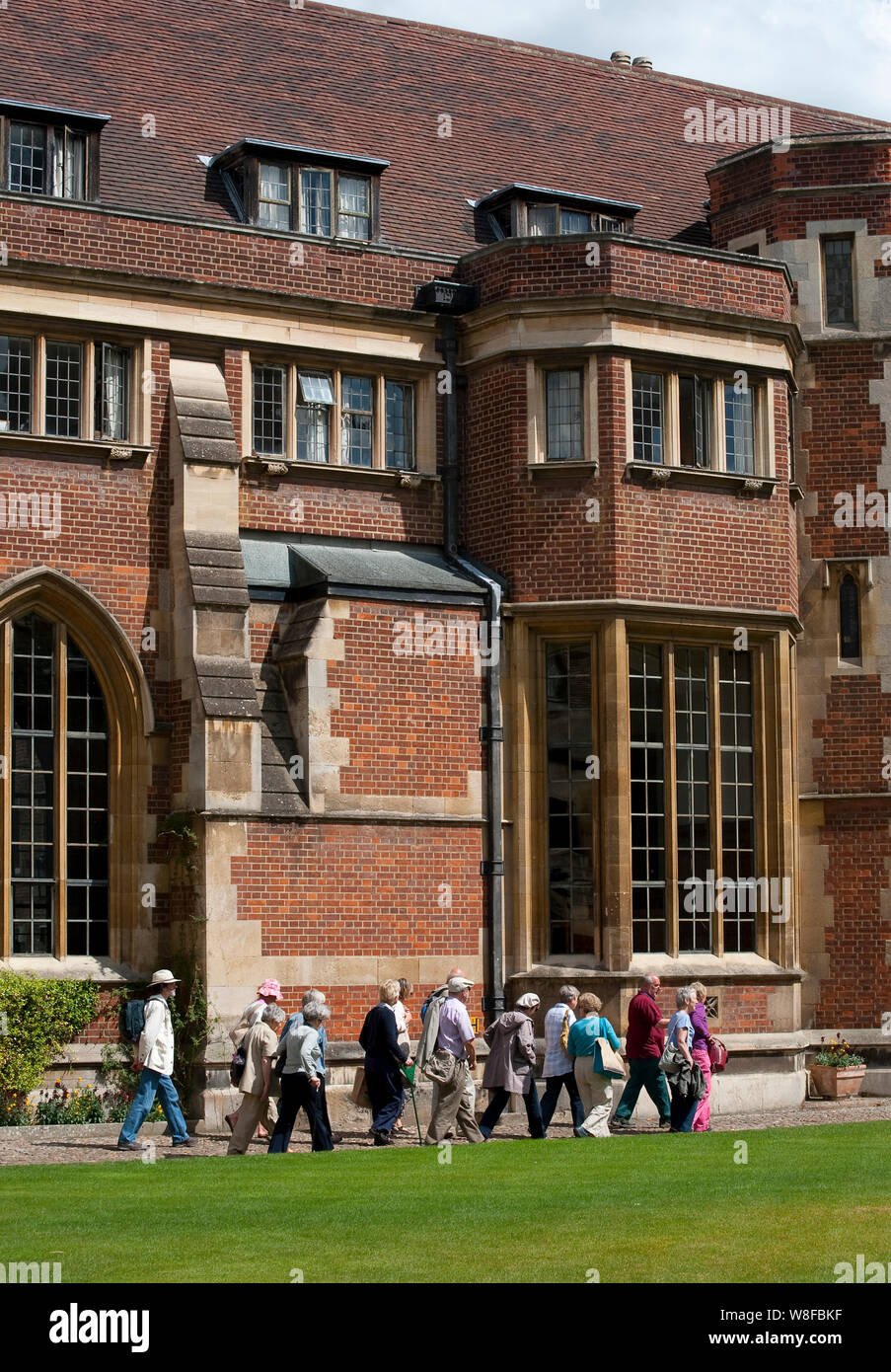 Tourists visiting a college in Cambridge, England. Stock Photo