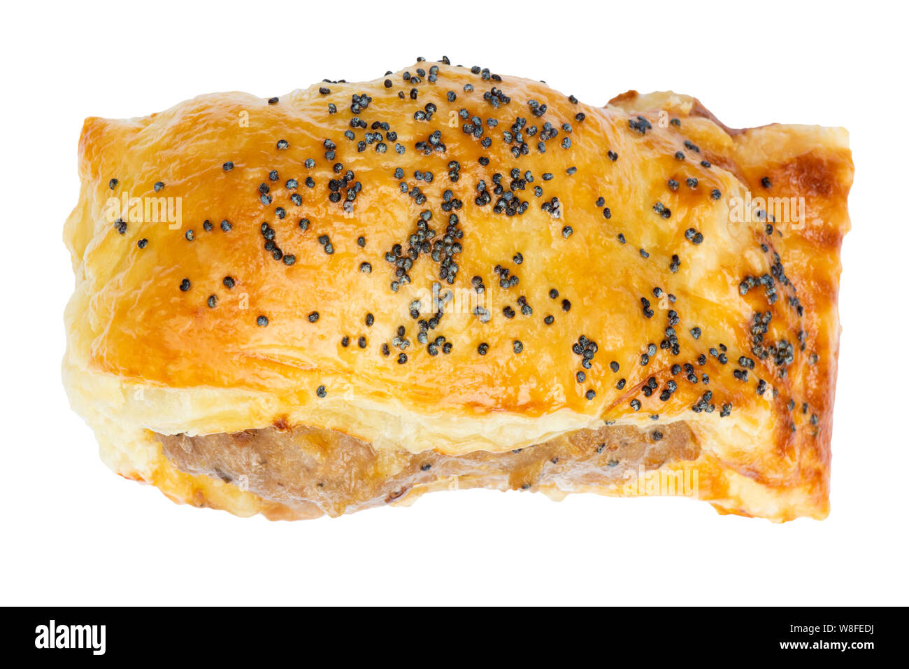Home made sausage roll with poppy seeds, cut out or isolated on a white background, UK. Stock Photo