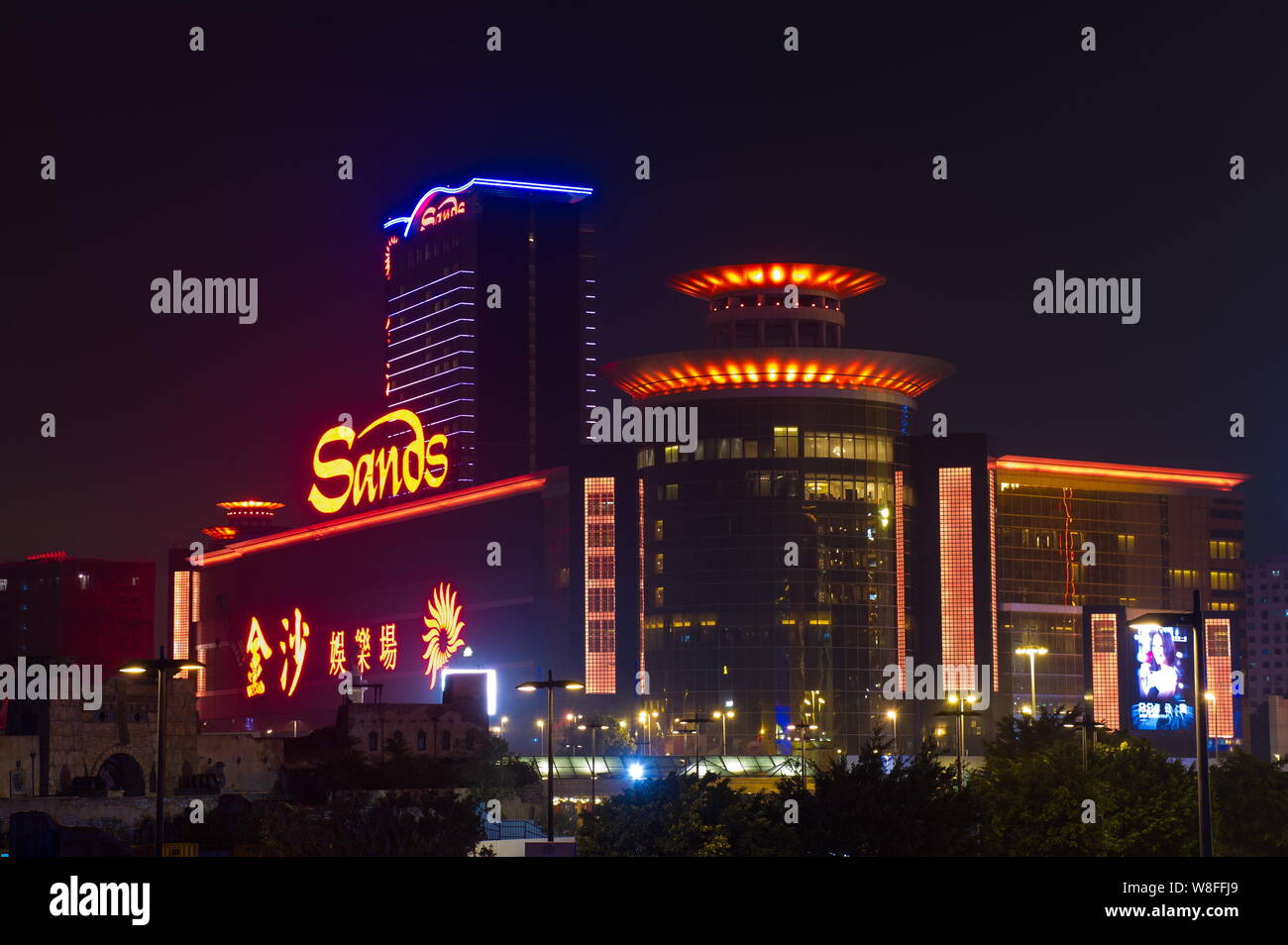 FILE--Night view of the Sands Macao Casino, owned by the Las Vegas Sands  Corporation, in Macao, China, 28 March 2015. It's been a while since inve  Stock Photo - Alamy