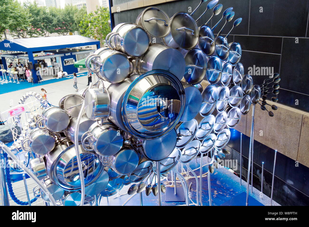 https://c8.alamy.com/comp/W8FFTH/a-giant-fish-made-out-of-cooking-utensils-is-on-display-during-a-promotional-event-by-german-cookware-maker-fissler-at-jiuguang-city-plaza-in-shanghai-W8FFTH.jpg