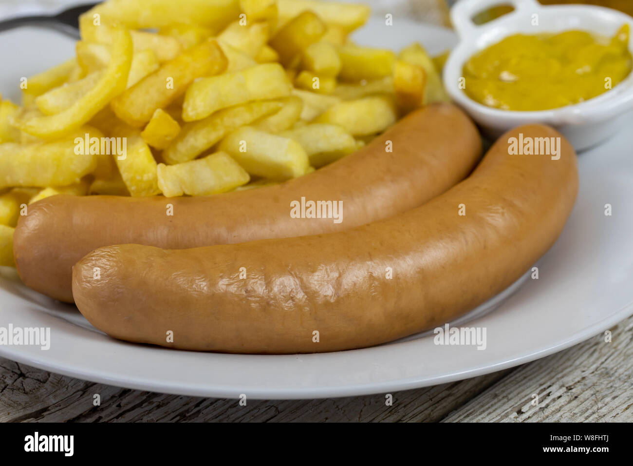 sausage and french fries Stock Photo Alamy