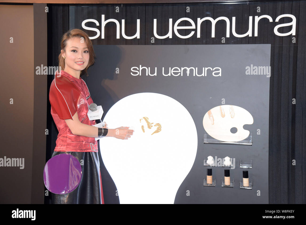 Hong Kong singer Joey Yung poses at a promotional event for Shu Uemura cosmetics in Hong Kong, China, 16 March 2015. Stock Photo