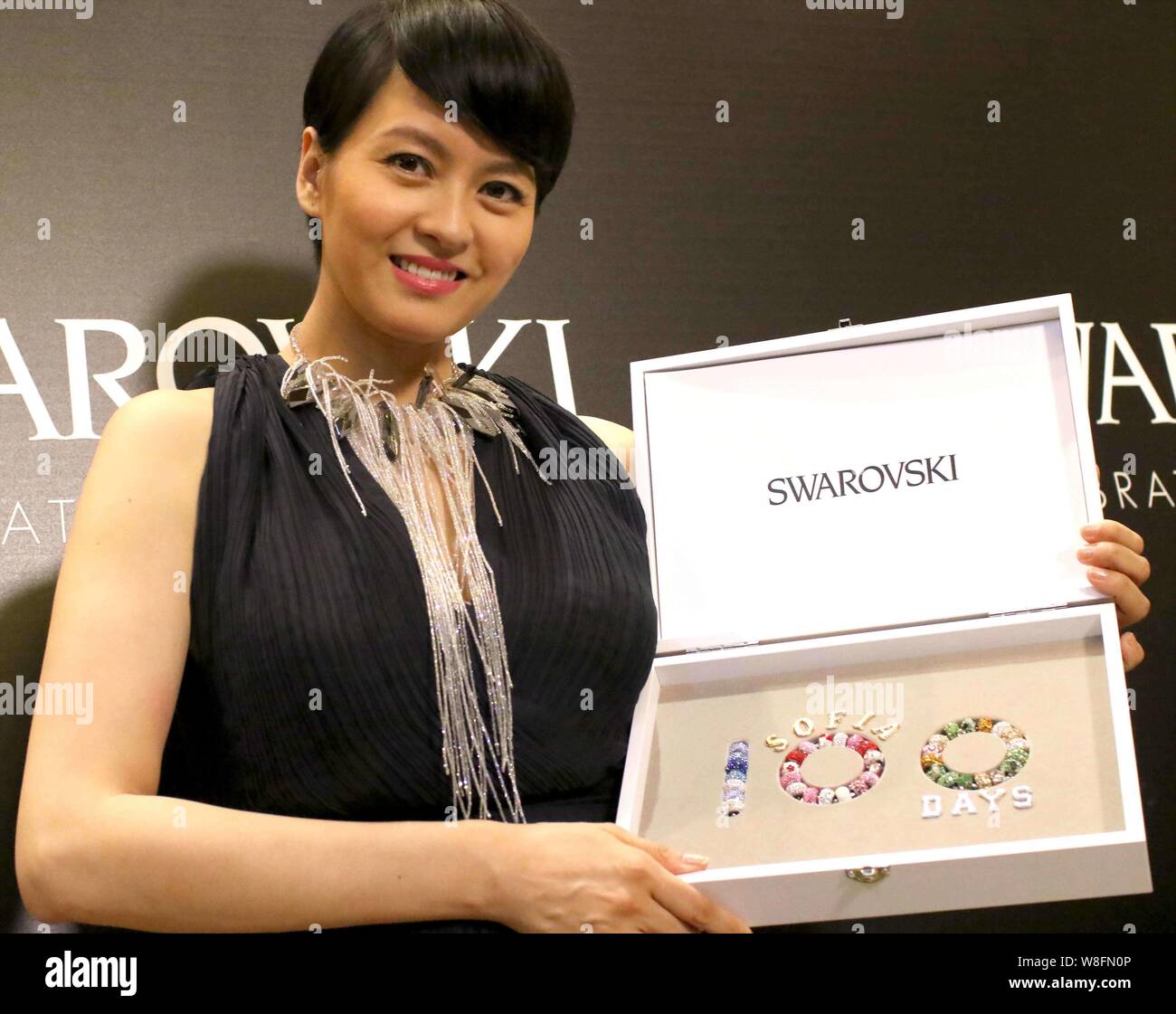 Hong Kong singer Gigi Leung poses during a promotional event for Swarovski in Shanghai, China, 11 June 2015. Stock Photo