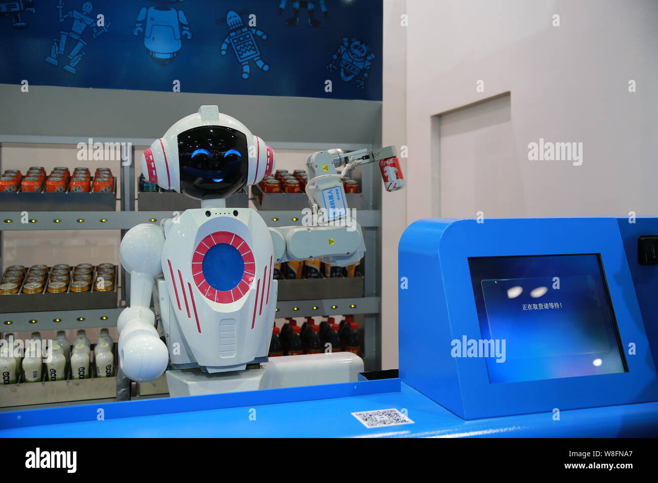 A shop assistant robot is on display during the 2015 World Robot Conference  in Beijing, China, 23 November 2015. The 2015 World Robot Conference kic  Stock Photo - Alamy