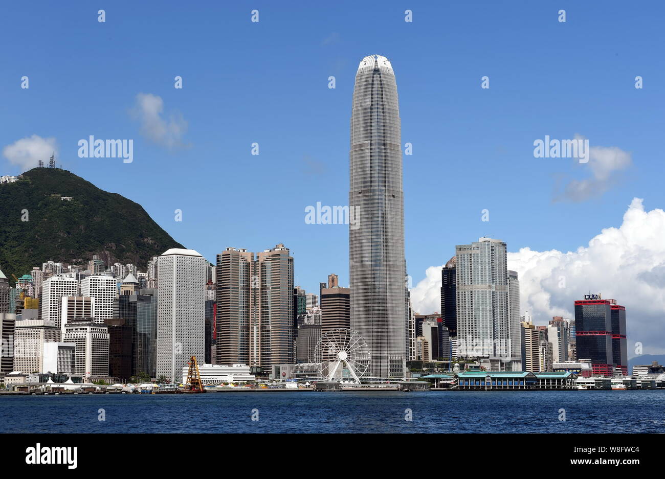 View of the Victoria Harbor with the Two IFC (International Finance Centre) Tower, tallest, and other skyscrapers and high-rise buildings in Hong Kong Stock Photo