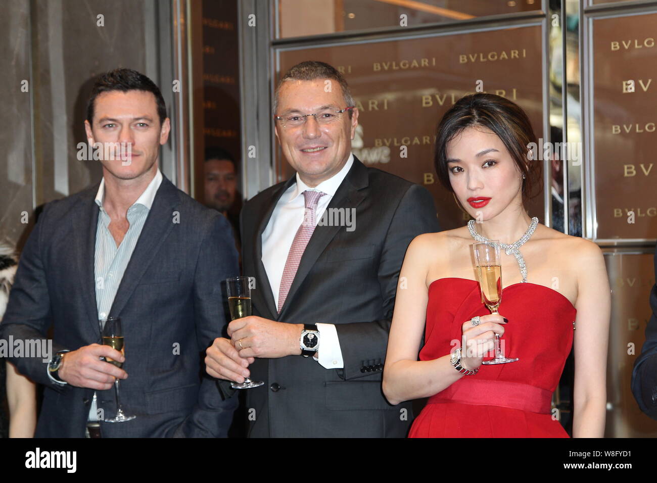 (From left) British actor Luke Evans, Bulgari CEO Jean-Christophe Babin and Taiwanese actress Shu Qi pose at the opening ceremony for Bulgari's flagsh Stock Photo