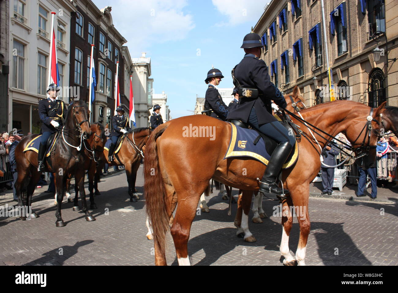 Cavalry soldiers riding at the Parliament on Prinsjesdag (annual presentation of Government Policy to the Parliament by Queen Beatrix) in The Hague, Stock Photo