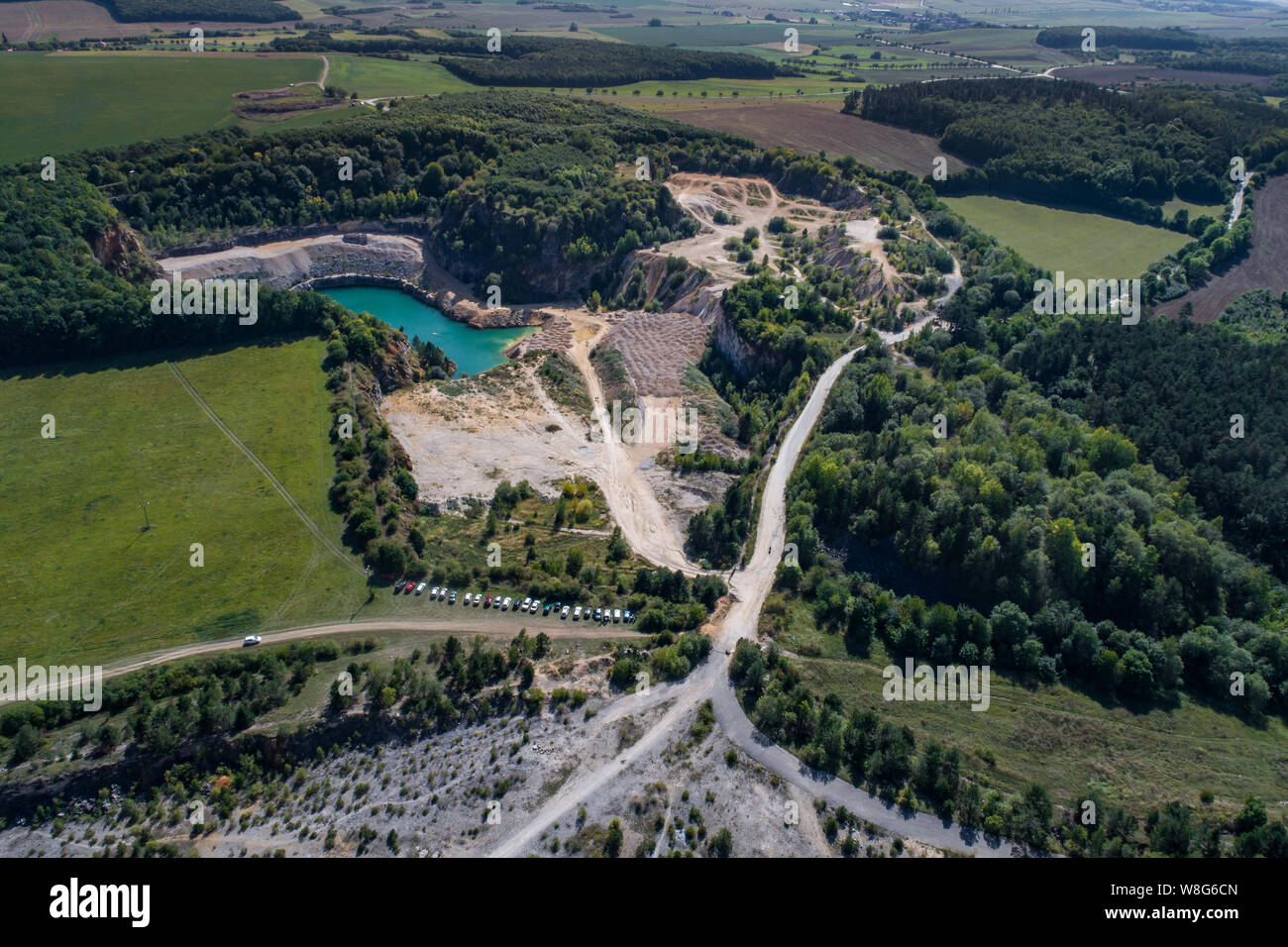 The quarry was opened in 1918 and over the course of the 20th century it gradually expanded its area by merging with the surrounding smaller quarries. Stock Photo