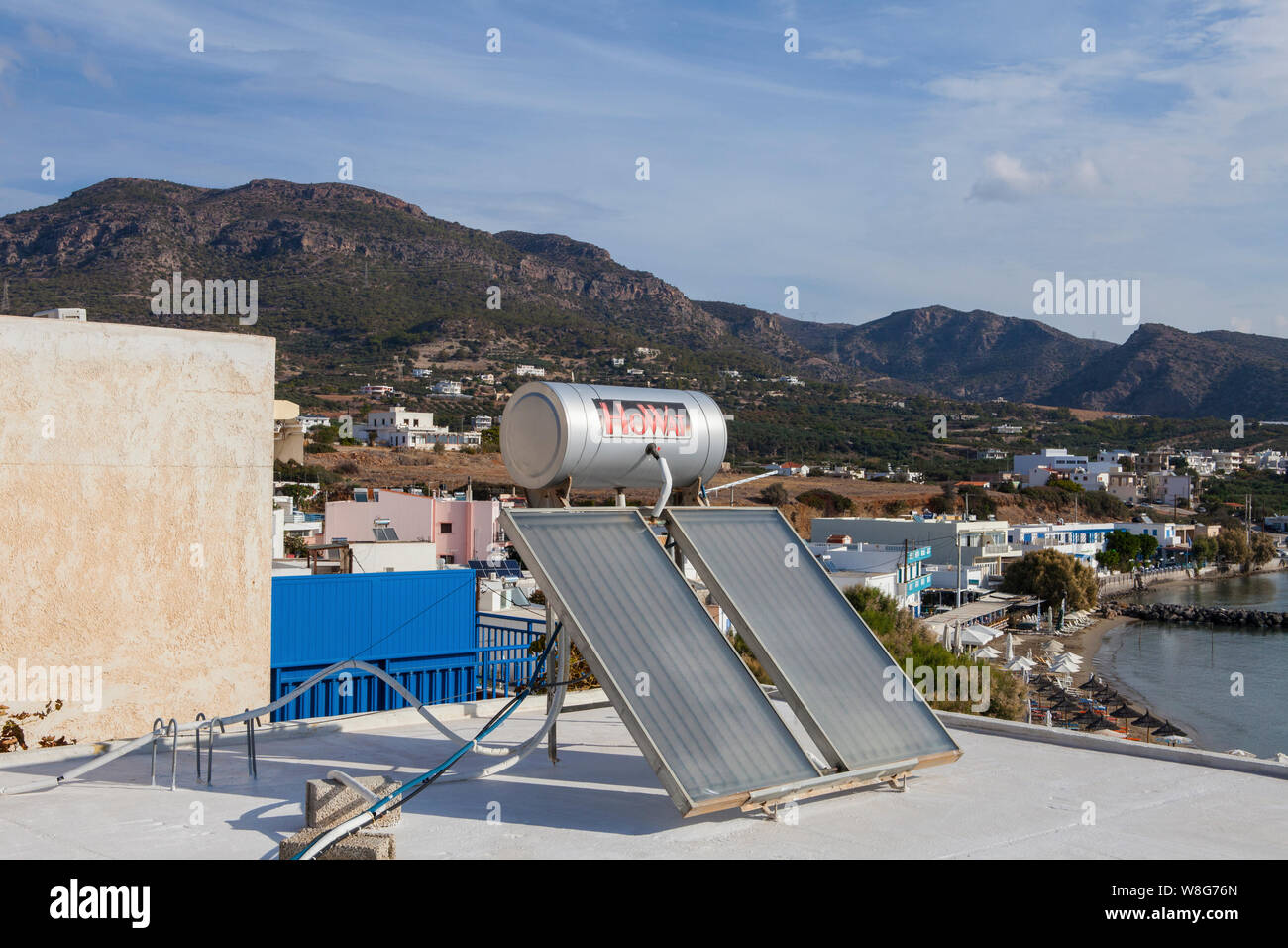 Ierapetra, Crete/Greece - October 14,2019: Green energy concept. Solar water heater on the roof of a house in Crete, Greece. Stock Photo