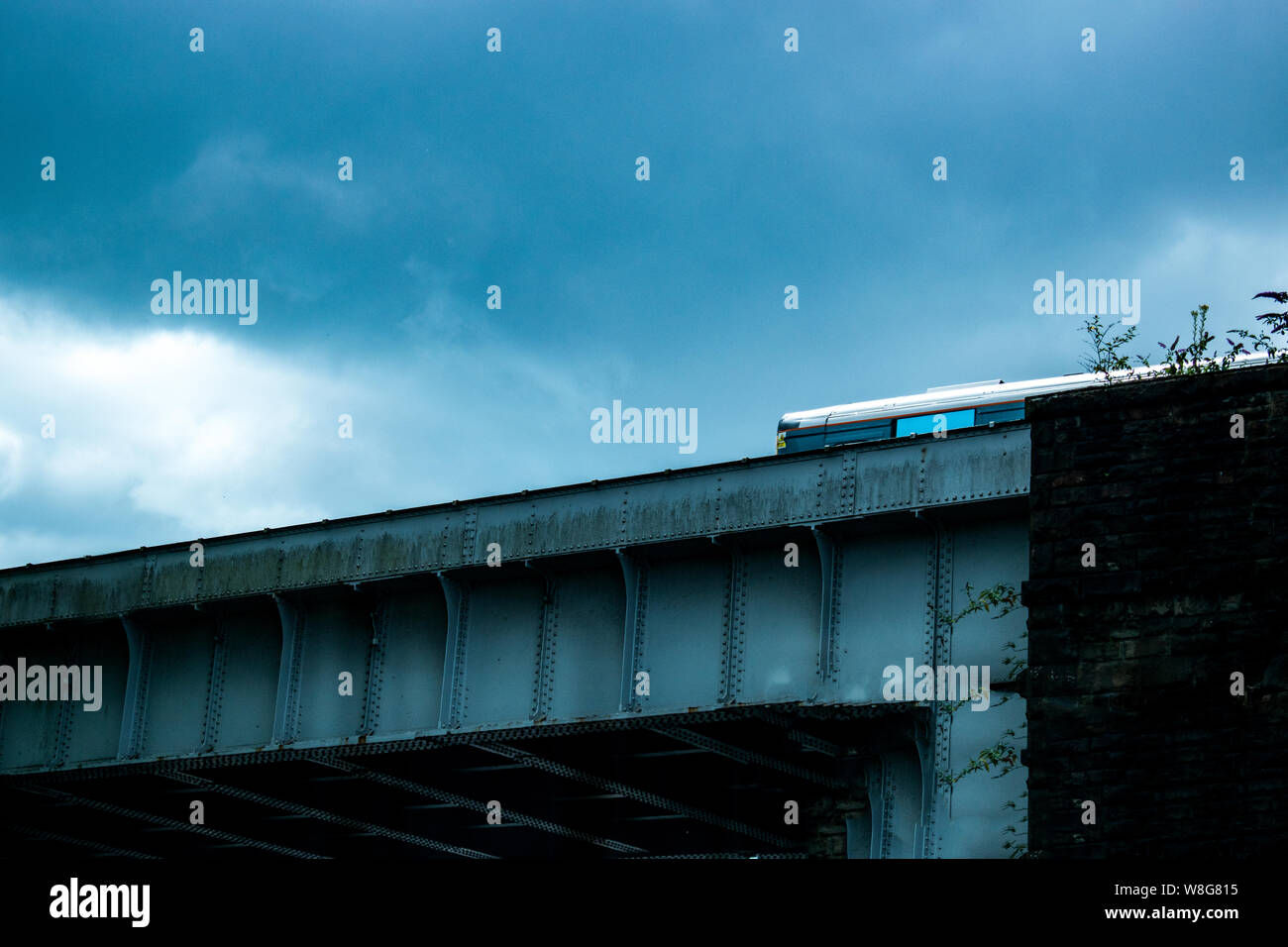Train travelling across a bridge in Swansea, wales, U.K. Stock Photo