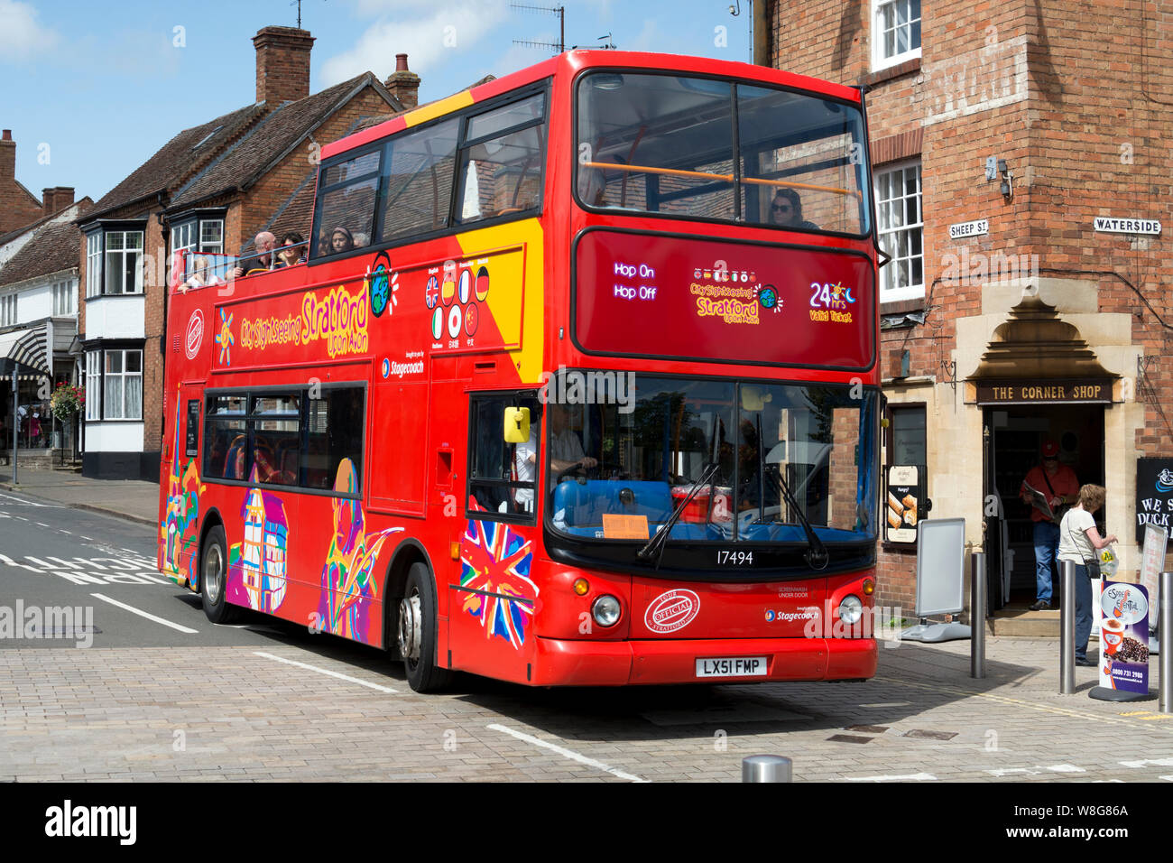 Open top bus tour in Stratford-upon-Avon town centre, Warwickshire, UK Stock Photo