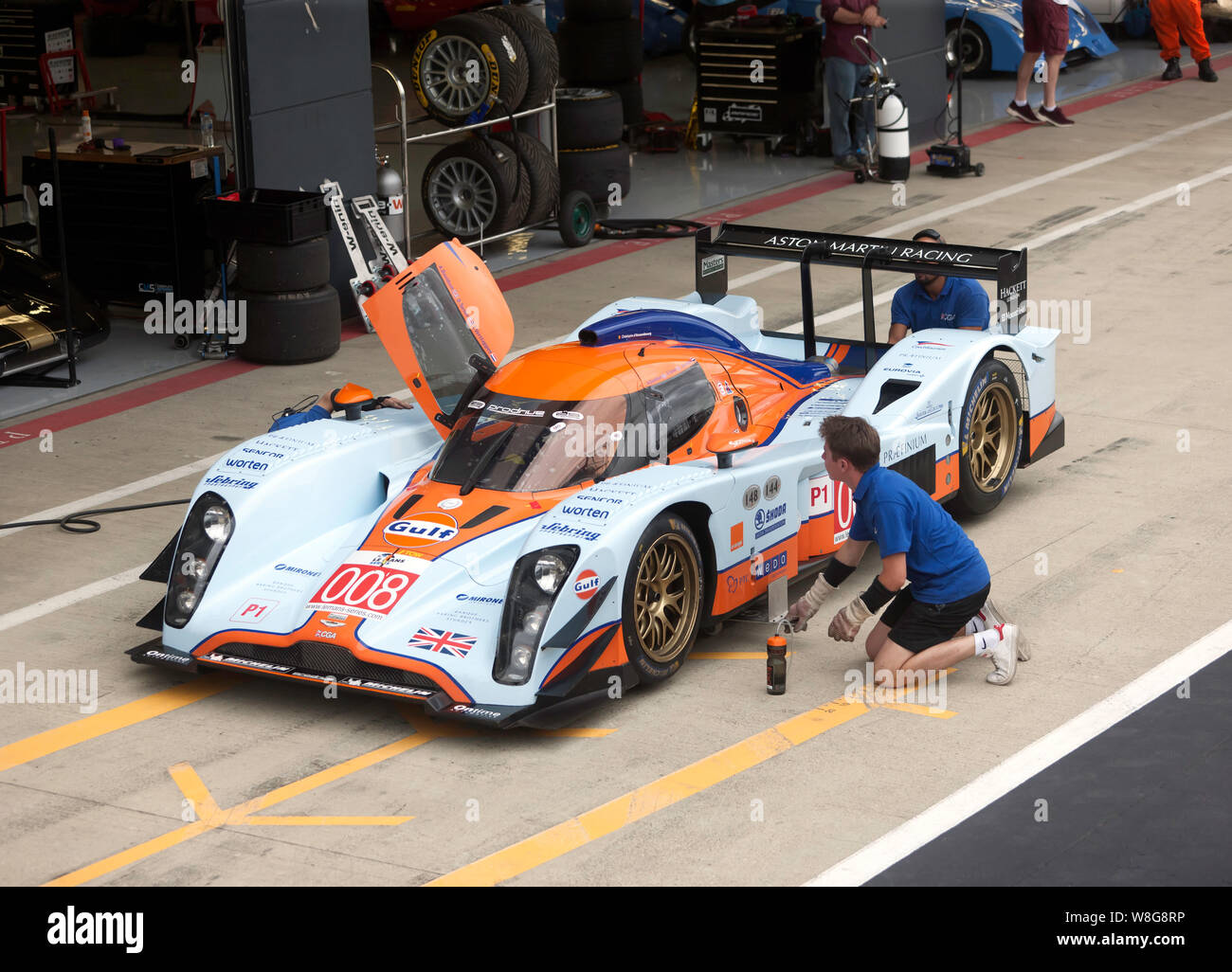 A Lola Aston DBR1-2 receiving some attention from its pit crew, during the qualifying session of the Aston Martin Trophy for Masters Endurance Legends Stock Photo