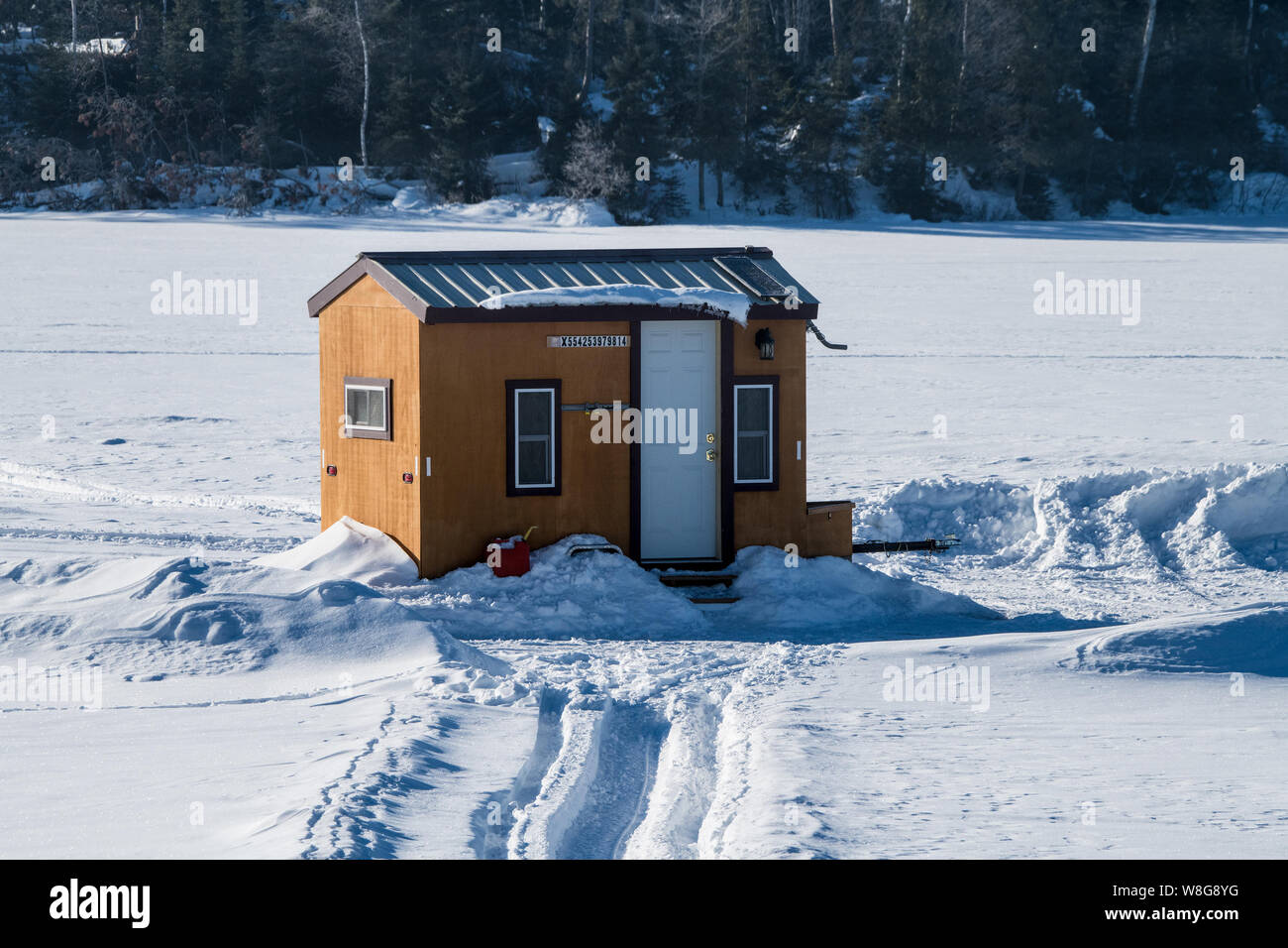 Ice shanty (a.k.a. ice shack, ice house, fishing shanty, fish house or ice  hut) is a portable sliding structure of varying sturdiness and complexity t  Stock Photo - Alamy