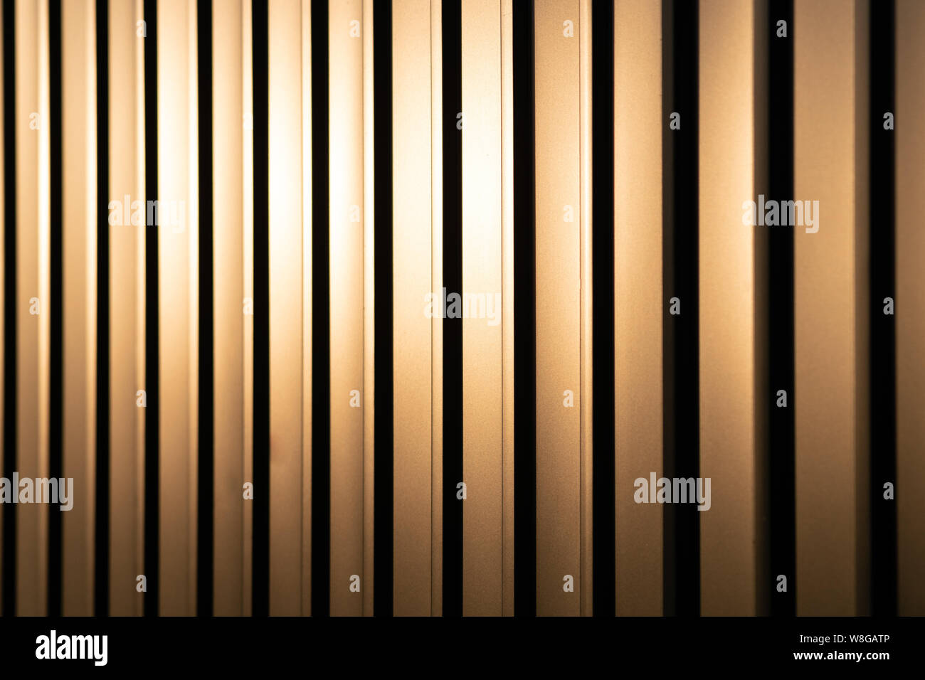 Profiled sheet yellow metal fence. Protection against breaking. Stock Photo
