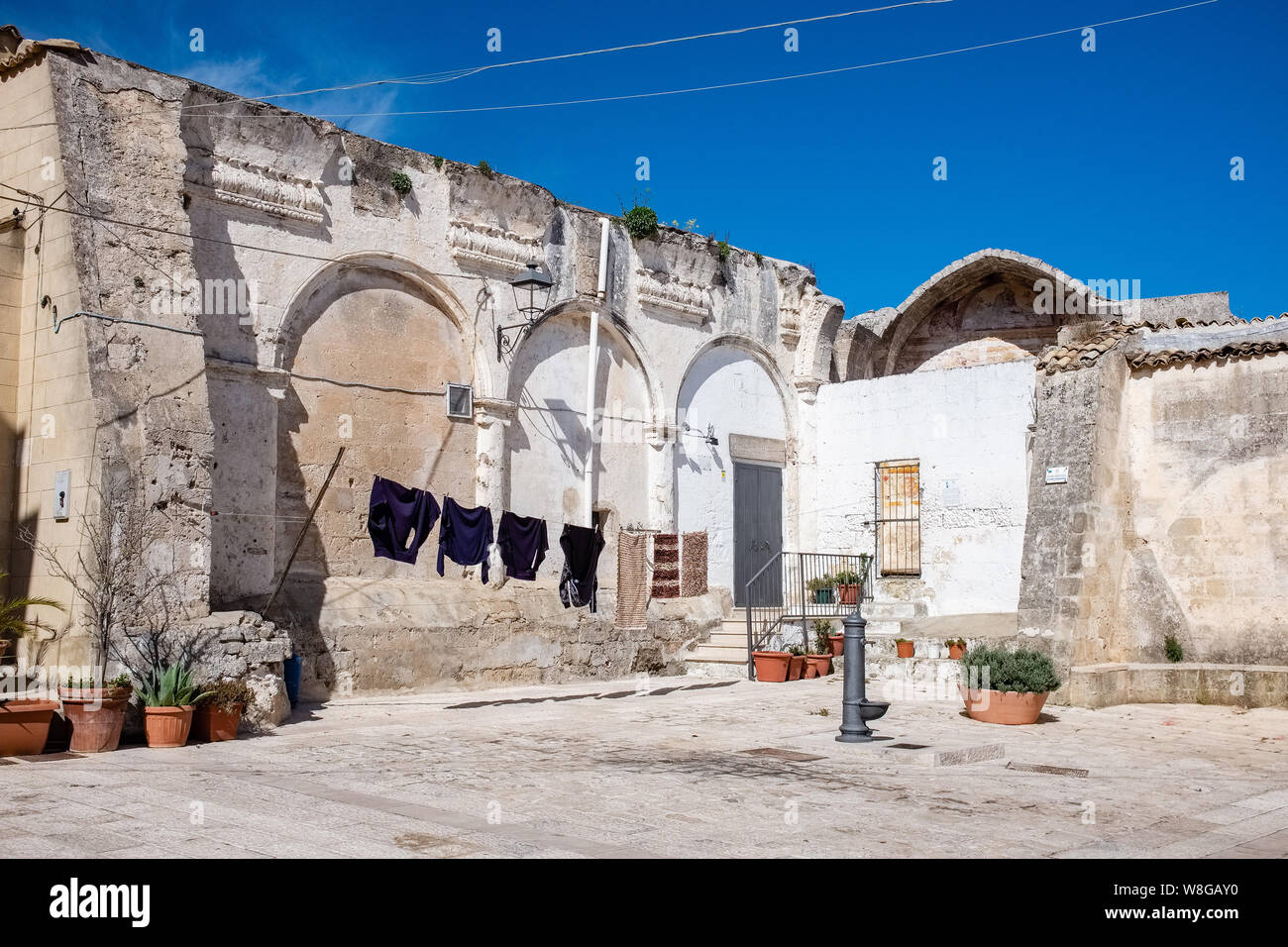 Little square in old town of Laterza. Puglia region, Italy Stock Photo