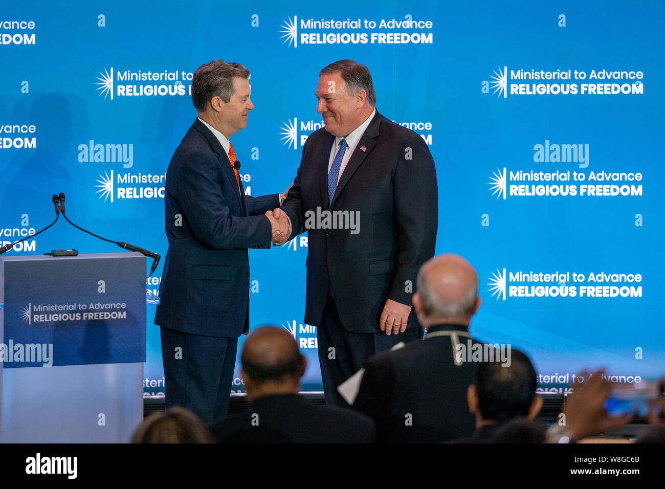 U.S. Secretary of State Michael R. Pompeo is introduced by Ambassador at Large for International Relgious Freedom Sam Brownback at the Ministerial to Stock Photo