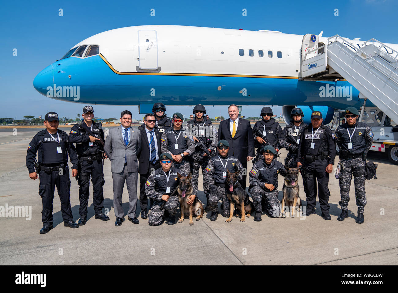 U.S. Secretary of State Michael R. Pompeo poses for a photo with local police prior to departure from Guayaquil, Ecuador, July 20, 2019. Stock Photo