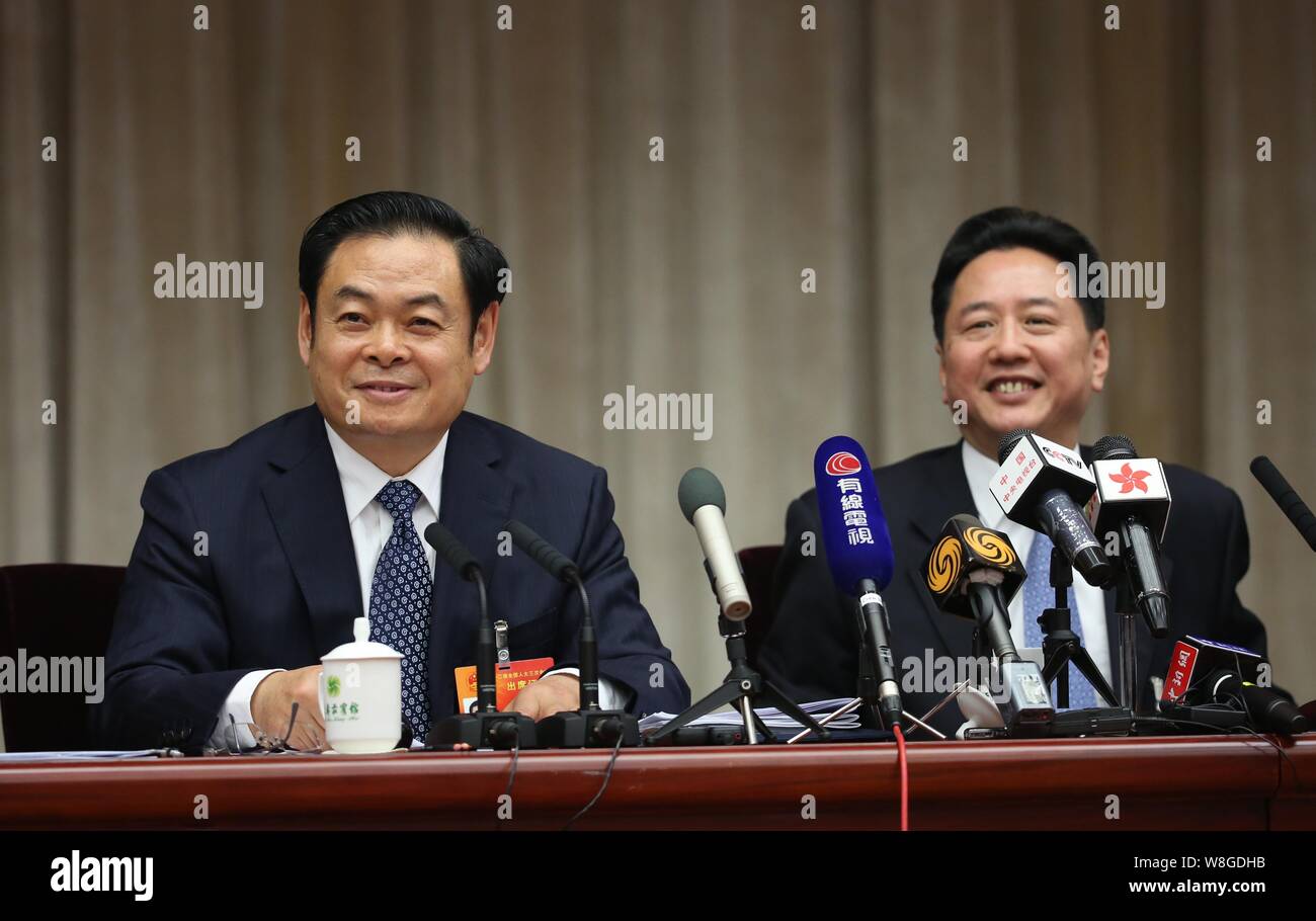 Wang Rulin, left, Secretary of the Shanxi provincial Committee of the