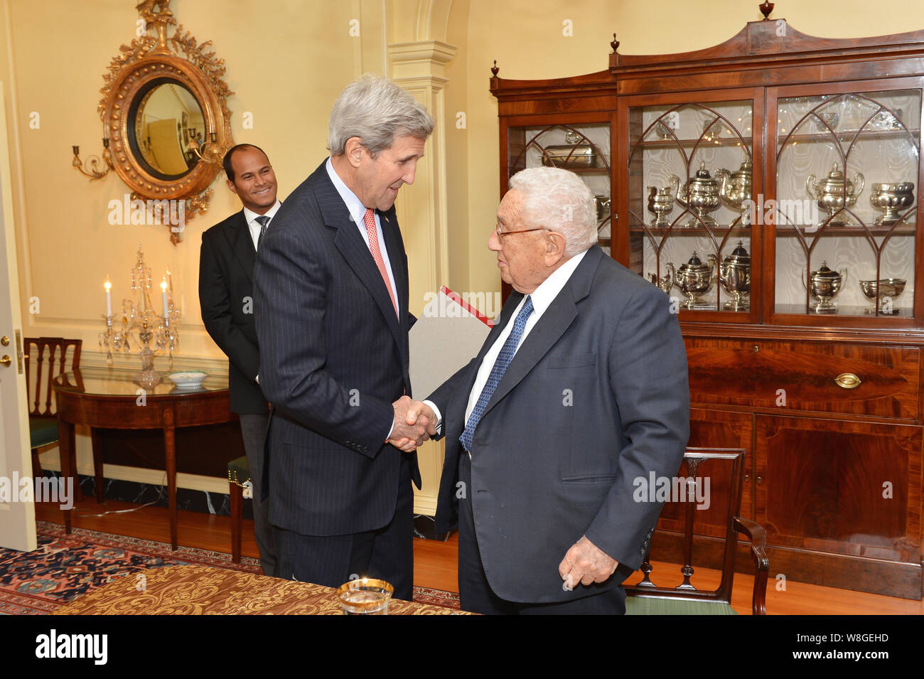 U.S. Secretary of State John Kerry meets with Former Secretary of State Henry Kissinger for dinner at the U.S. Department of State in Washington, D.C. Stock Photo