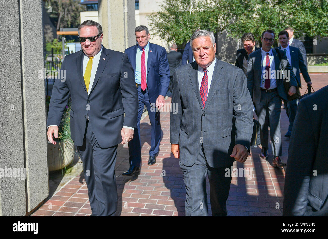 U.S. Secretary of State Michael R. Pompeo is greeted by Hoover Institution Director Thomas Gilligan upon arrival to the Hoover Institution at Stanford Stock Photo