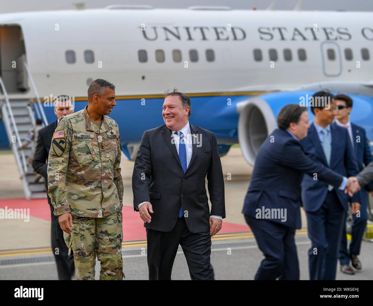 U.S. Secretary of State Mike Pompeo is greeted by USFK Commander General Vincent Brooks upon arrival to Osan Air Base in Osan, Seoul on June 13, 2018. Stock Photo