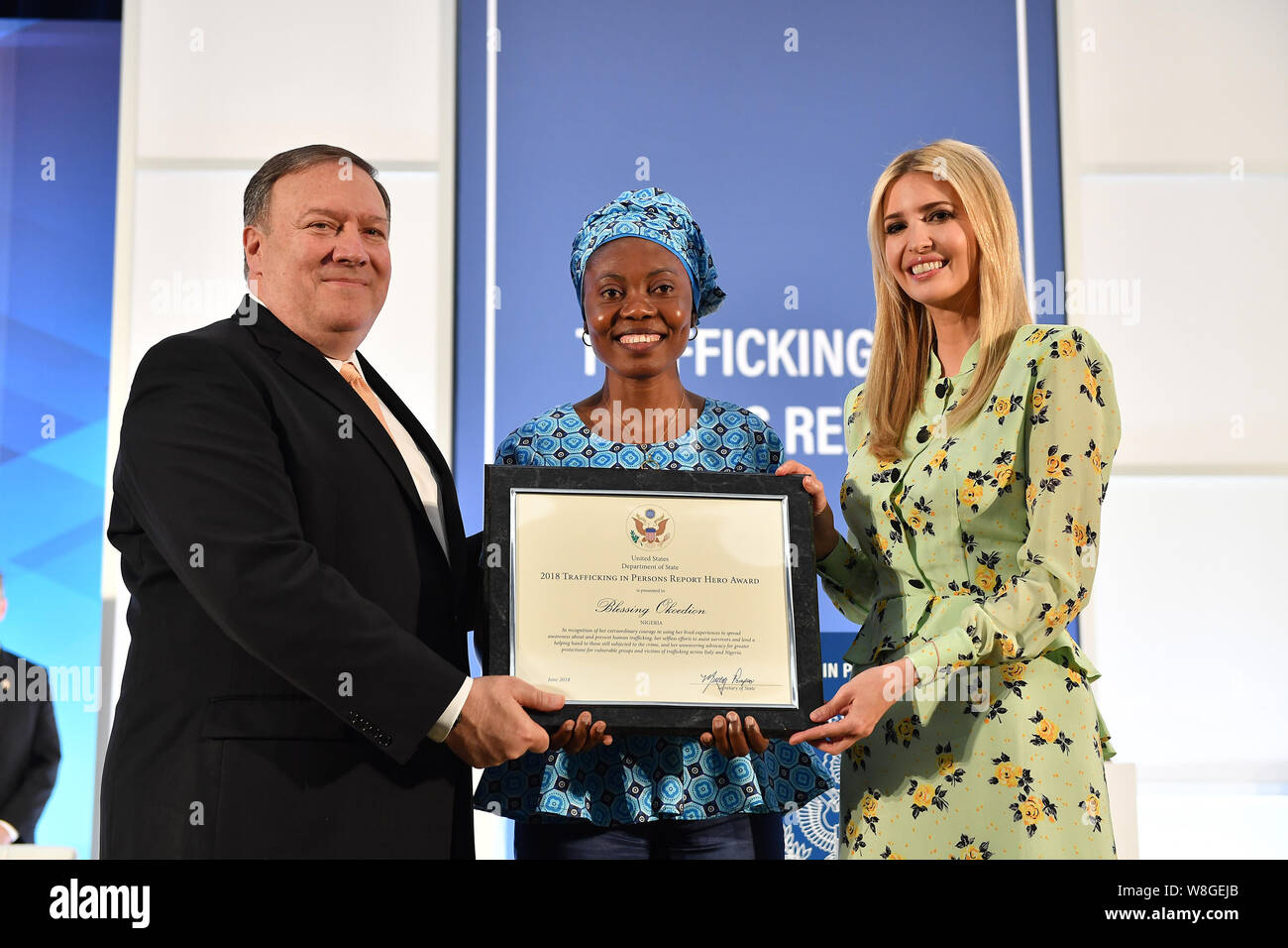 Secretary Pompeo Presents Certificate to 2018 'TIP Report Hero' Blessing Okoedion of Nigeria Stock Photo