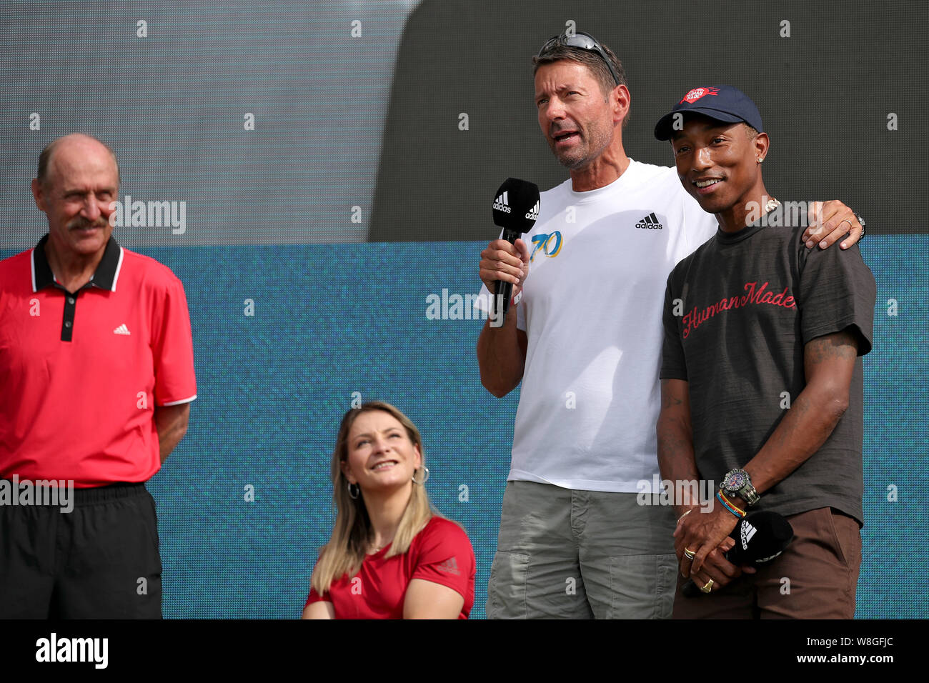 Herzogenaurach Germany. 09th Aug 2019. Stan Smith l r former tennis professional Kristina Vogel former German track cyclist and two time Olympic champion Kasper Rorsted adidas CEO and U.S. singer Phar...