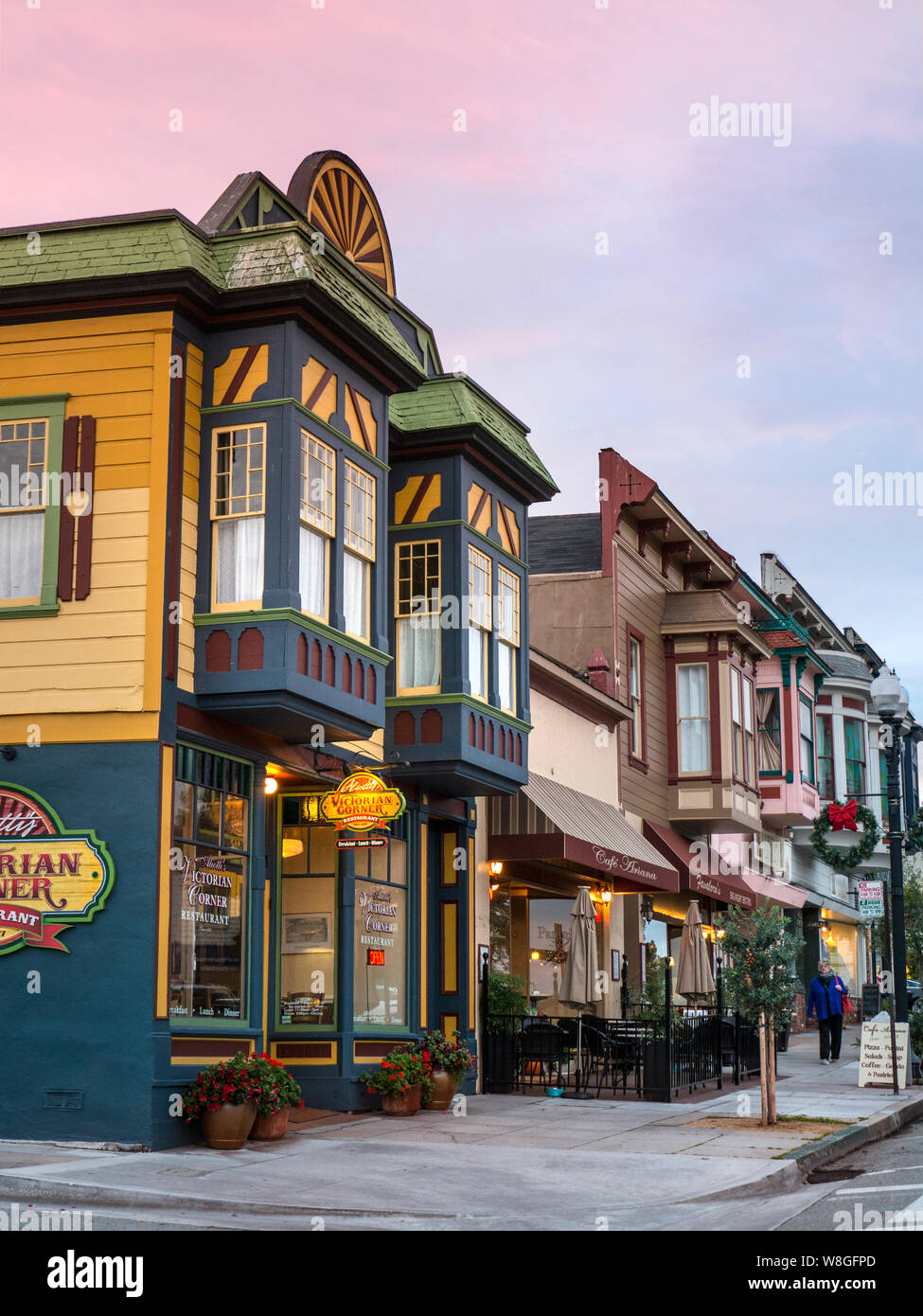 PACIFIC GROVE CA.Typical charming small Californian town American clapboard restaurants and shops at dusk Main Street Pacific Grove California USA  'Americana' Stock Photo