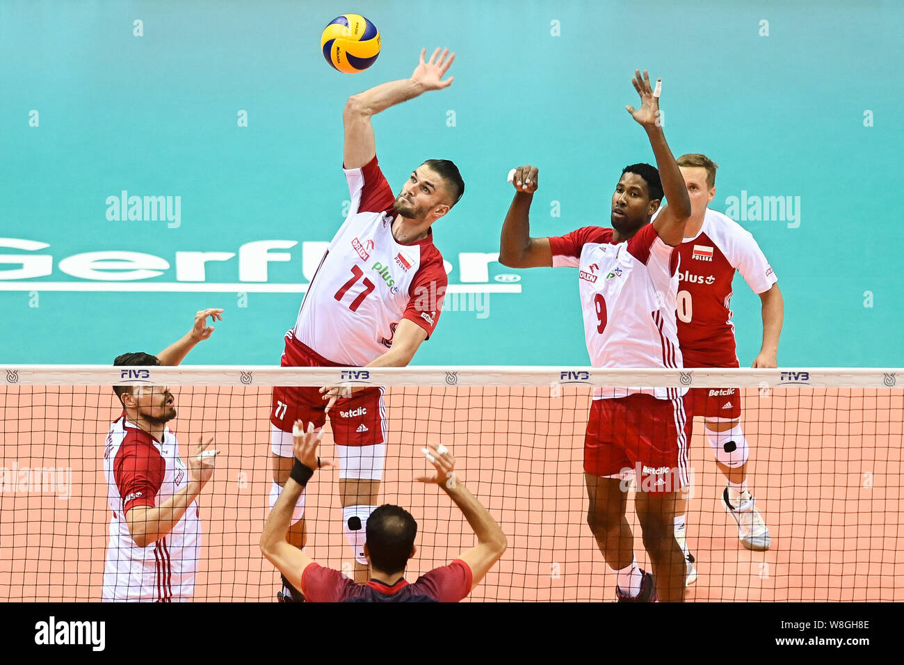 Karol Klos (L) and Wilfredo Leon (R) from Poland are seen in action during Men's Olympics Qualifiers Tournament Pool D match between Poland and Tunisia.(Poland beat Tunisia : 3-0) Stock Photo