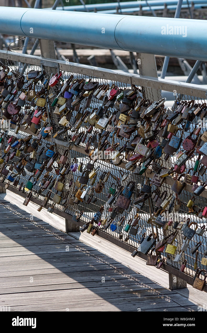 Krakow, Poland 27 July, 2019 Kladka Bernatka Bridge over the Vistula river with a attached