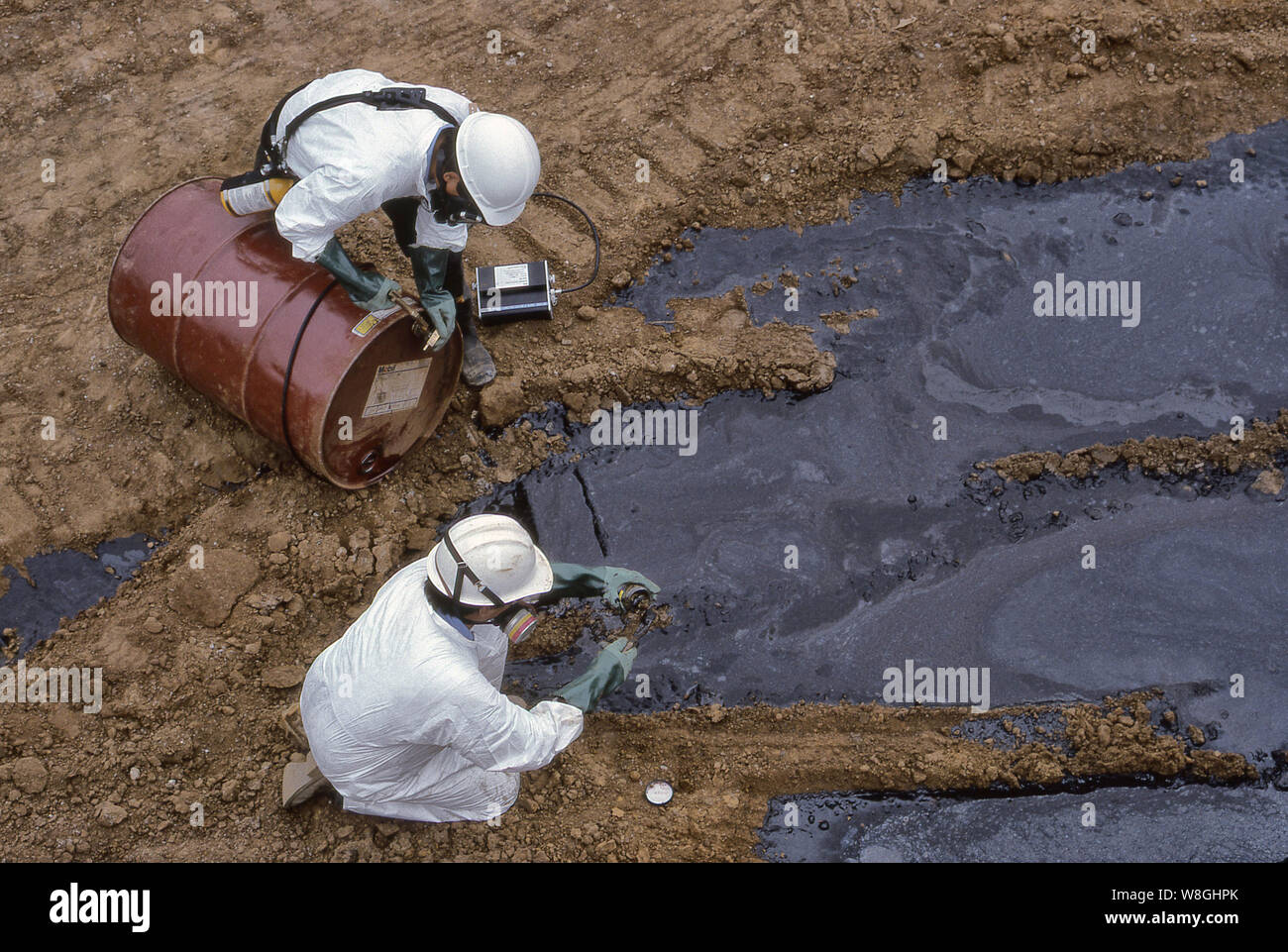 Environmental Technicians removing a toxic spill. Stock Photo