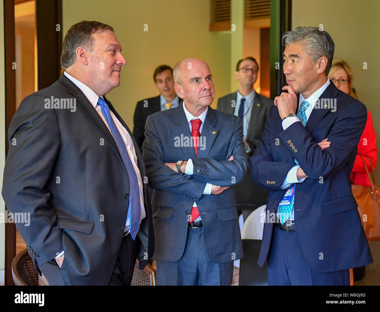 U.S. Secretary of State Mike Pompeo chat with U.S. Ambassador to the Philippines Sung Kim behind-the-scenes at the Singapore Summit in Singapore on Ju Stock Photo