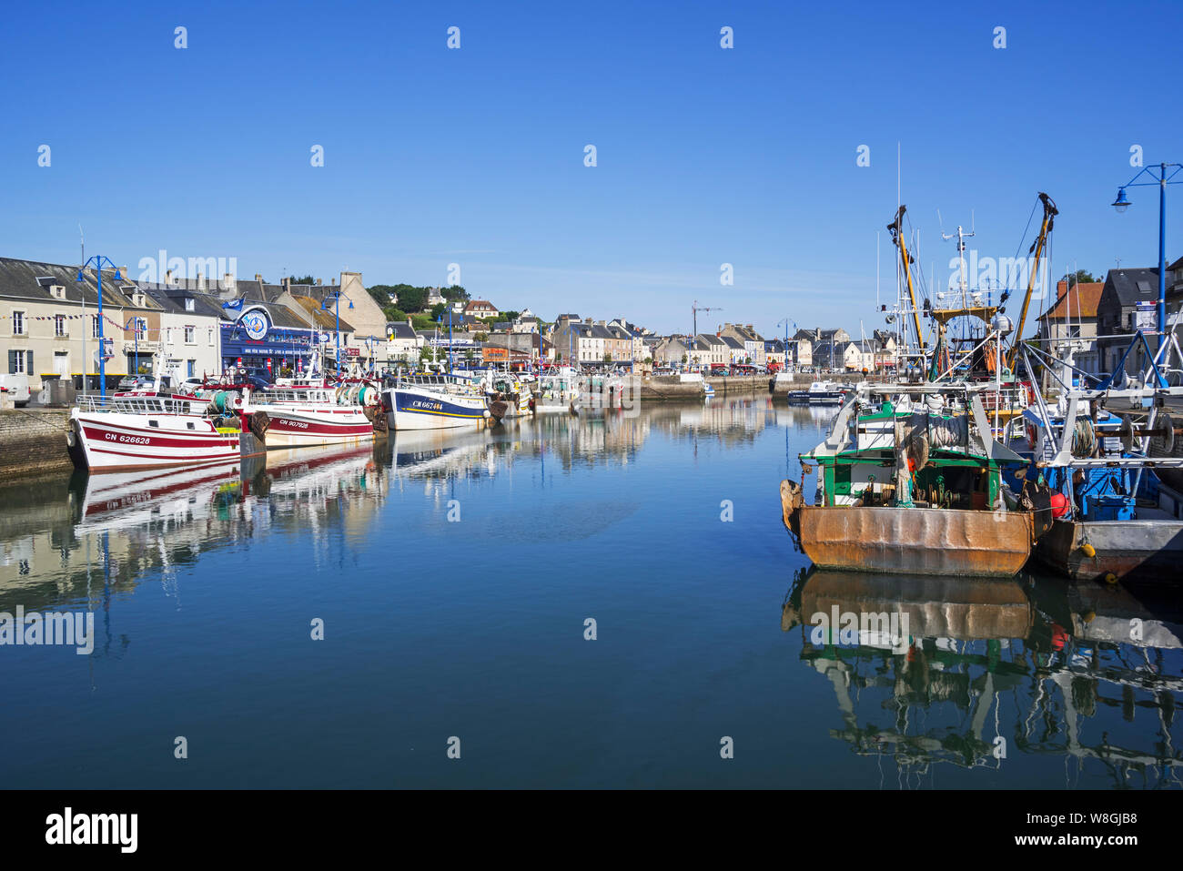 Fishing boats / trawlers docked in the harbour of Port-en-Bessin-Huppain along the English Channel, Calvados, Normandy, France Stock Photo
