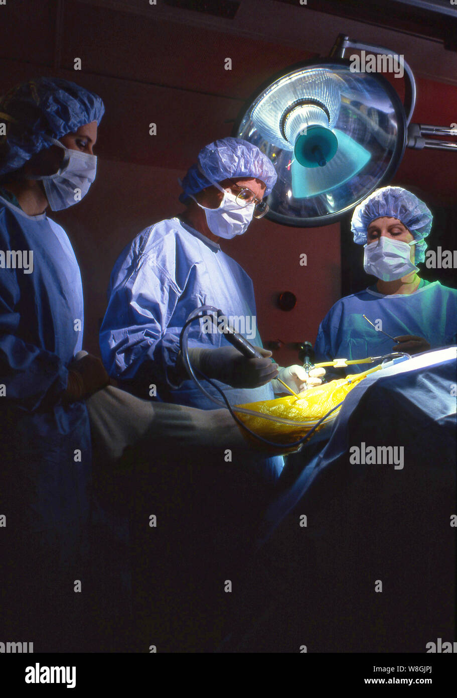 Medical professionals attending to patients Stock Photo