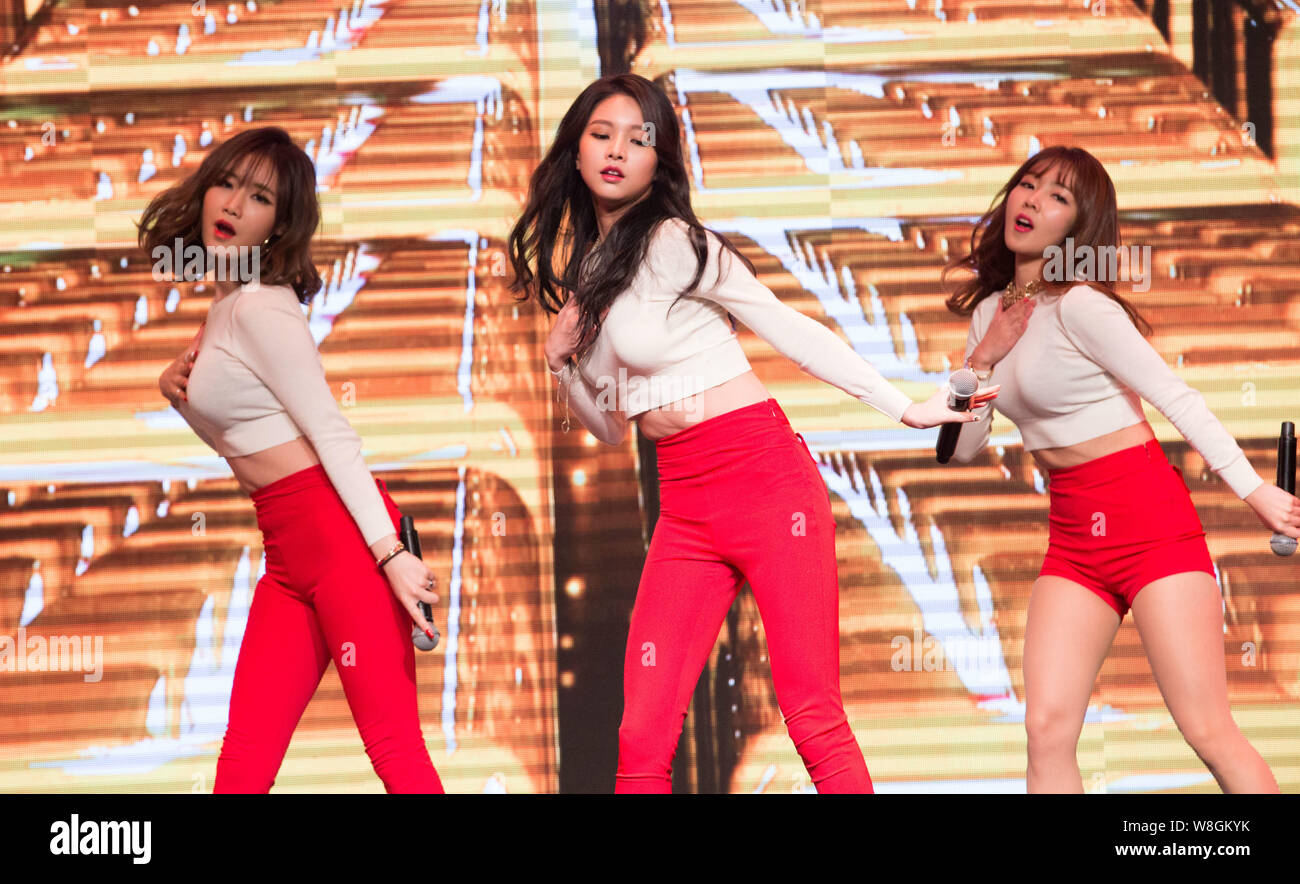 Members of South Korean girl group Fiestar sing and dance during their premiere concert in Beijing, China, 27 December 2015. Stock Photo