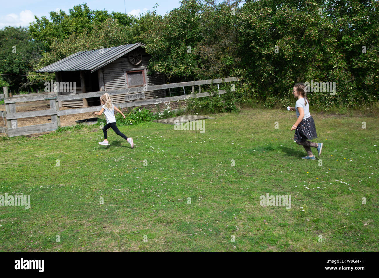 Children running in country Stock Photo