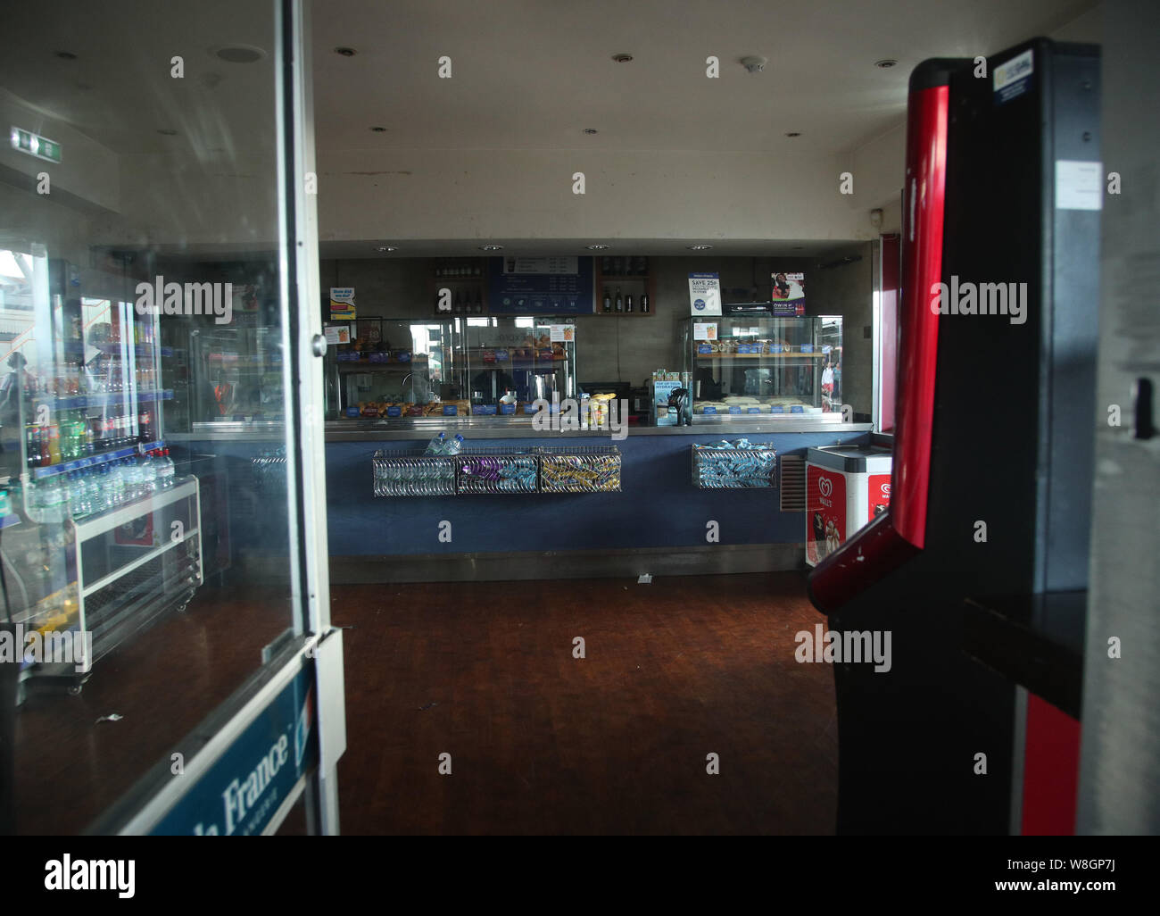 An empty shop in darkness at Clapham Junction station in London during ...