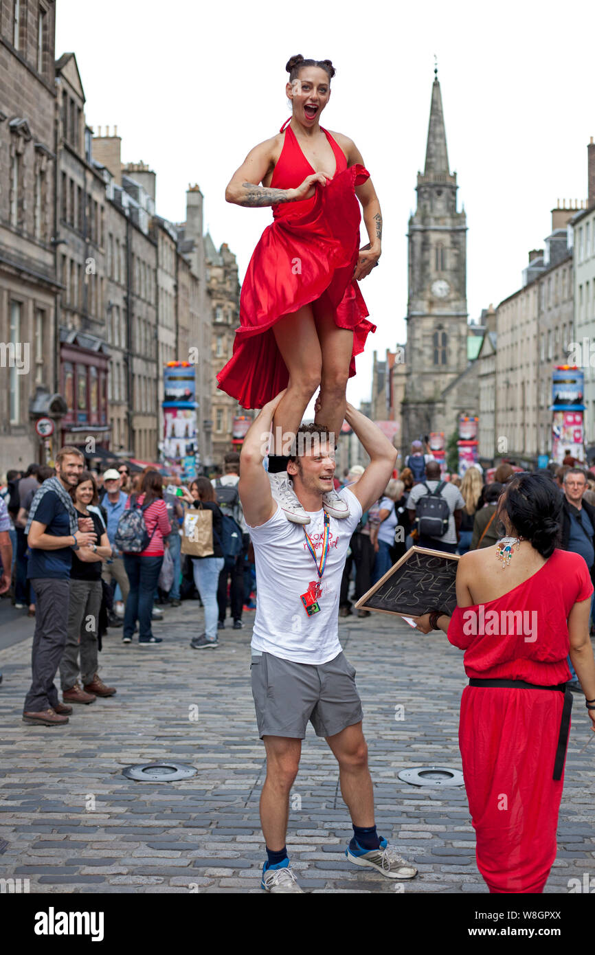 Edinburgh, Scotland, UK. 9th August 2019. Nicole Burgio, Ben Grinberg, Almanac Dance Circus Theatre blends physical theatre, live music, world-class circus, aerial performance and audience interaction in xoxo moongirl; the breathtaking story of one woman processing a family life riddled with domestic abuse. Almanac's first ever ensemble-devised, full-length solo show features Nicole Burgio and award-winning composer Melanie Hsu in a semi-autobiographical, escaping the gravitational pull of trauma, navigating complicated relationships. Credit: Arch White/Alamy Live News Stock Photo