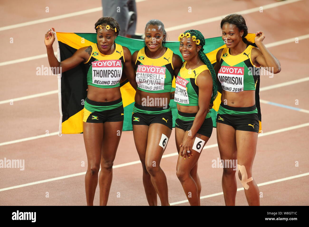 (From left) Elaine Thompson, Veronica Campbell-Brown, Shelly-Ann Fraser-Pryce and Natasha Thompson of Jamaica celebrate after winning the women's 4x10 Stock Photo