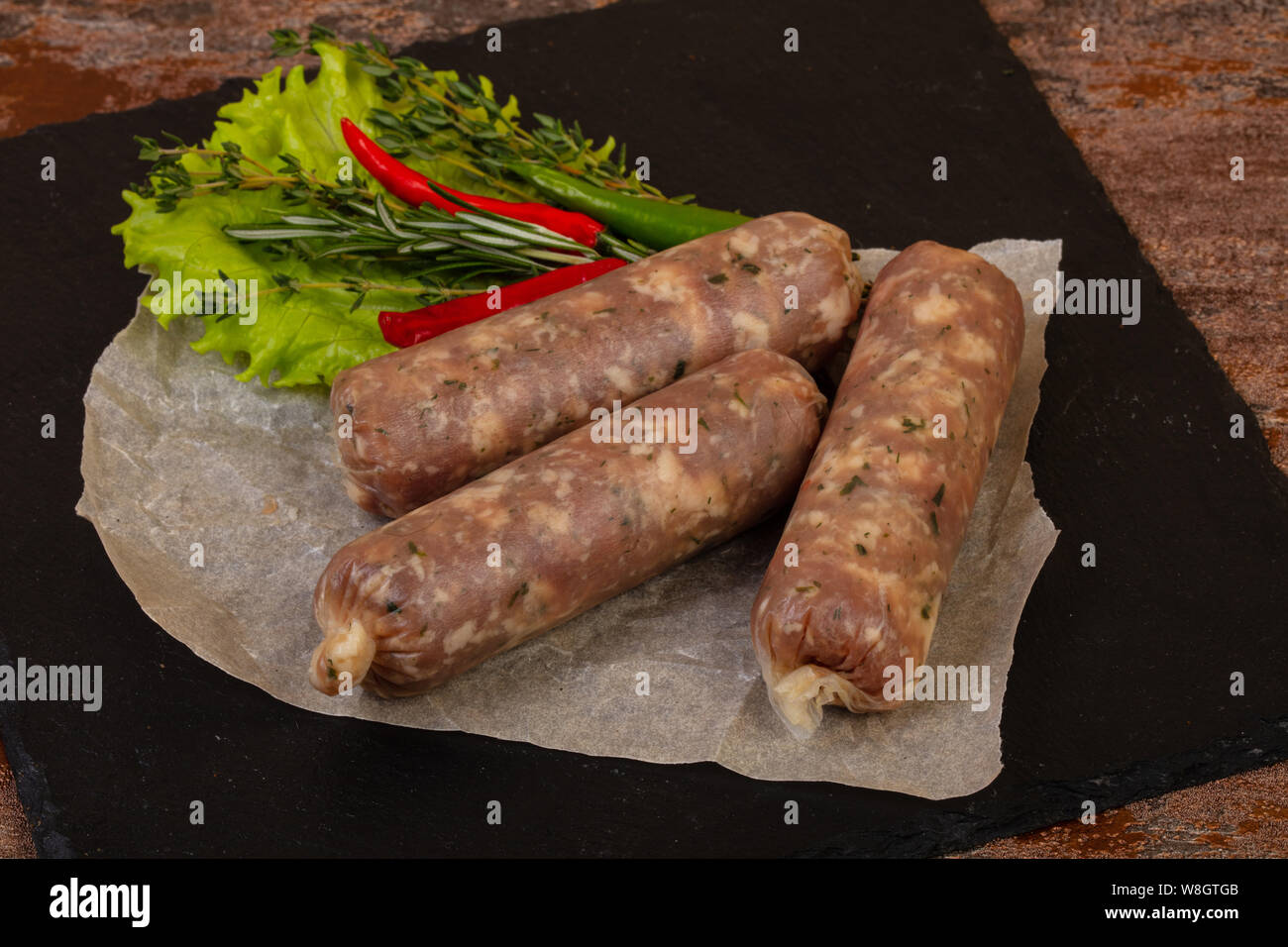 Raw pork sausages for grill Stock Photo Alamy