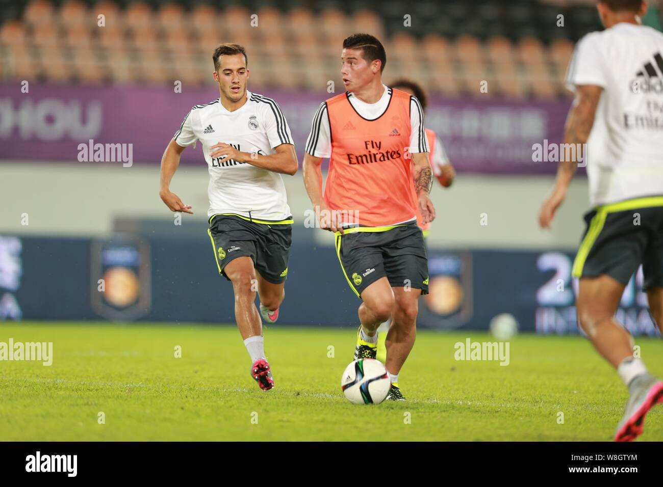James Rodriguez, center, and teammates of Real Madrid take part in a training session in Guangzhou city, south China's Guangdong province, 26 July 201 Stock Photo